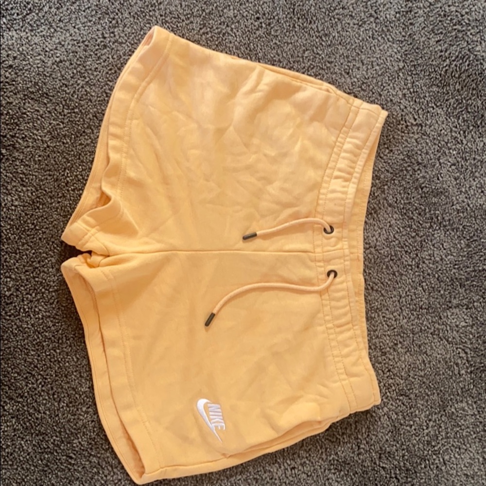 Peach Nike shorts